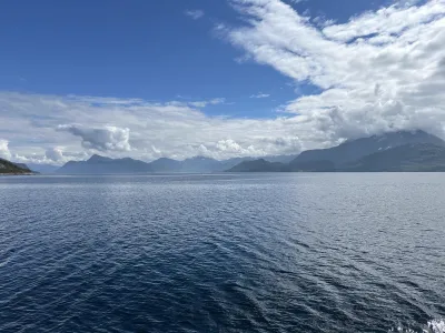 Mountain view from a wide bay before entering the fjord